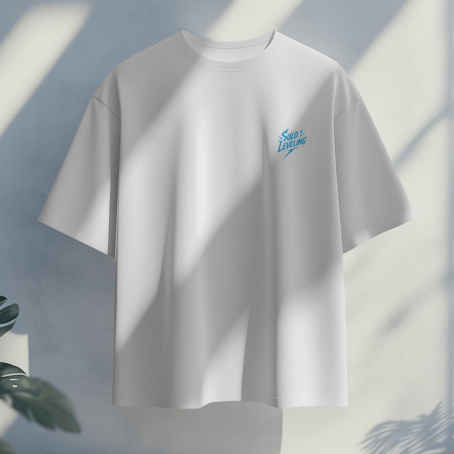 White t-shirt with a small blue logo on a light gray background